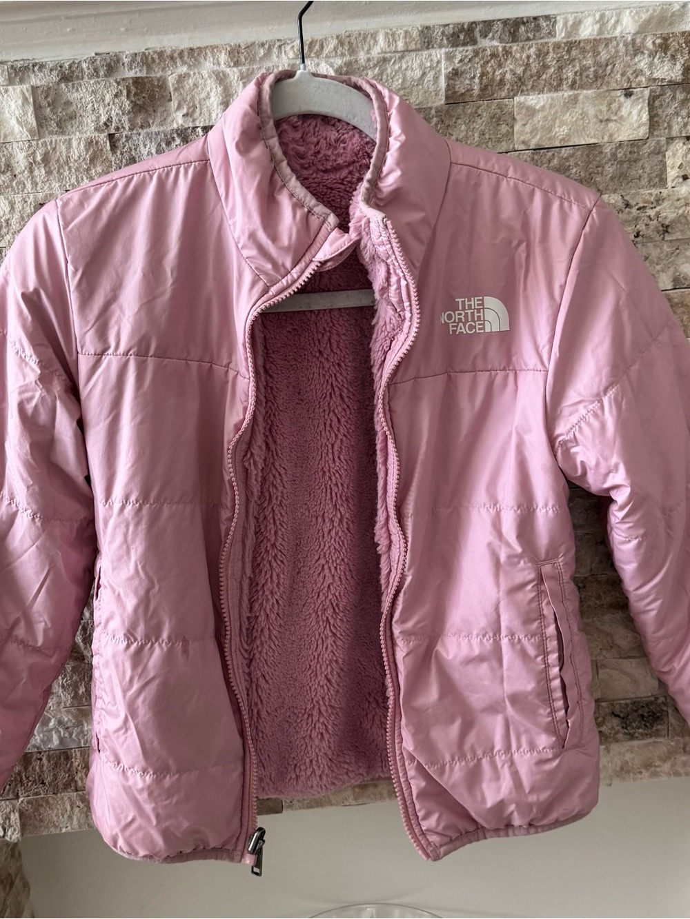 The North Face girls Light Pink Puffy Jacket with Plush Lining